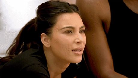 Kim-Kardashian-looking-at-Kanye-West-shaking-their-heads-GIF.gif