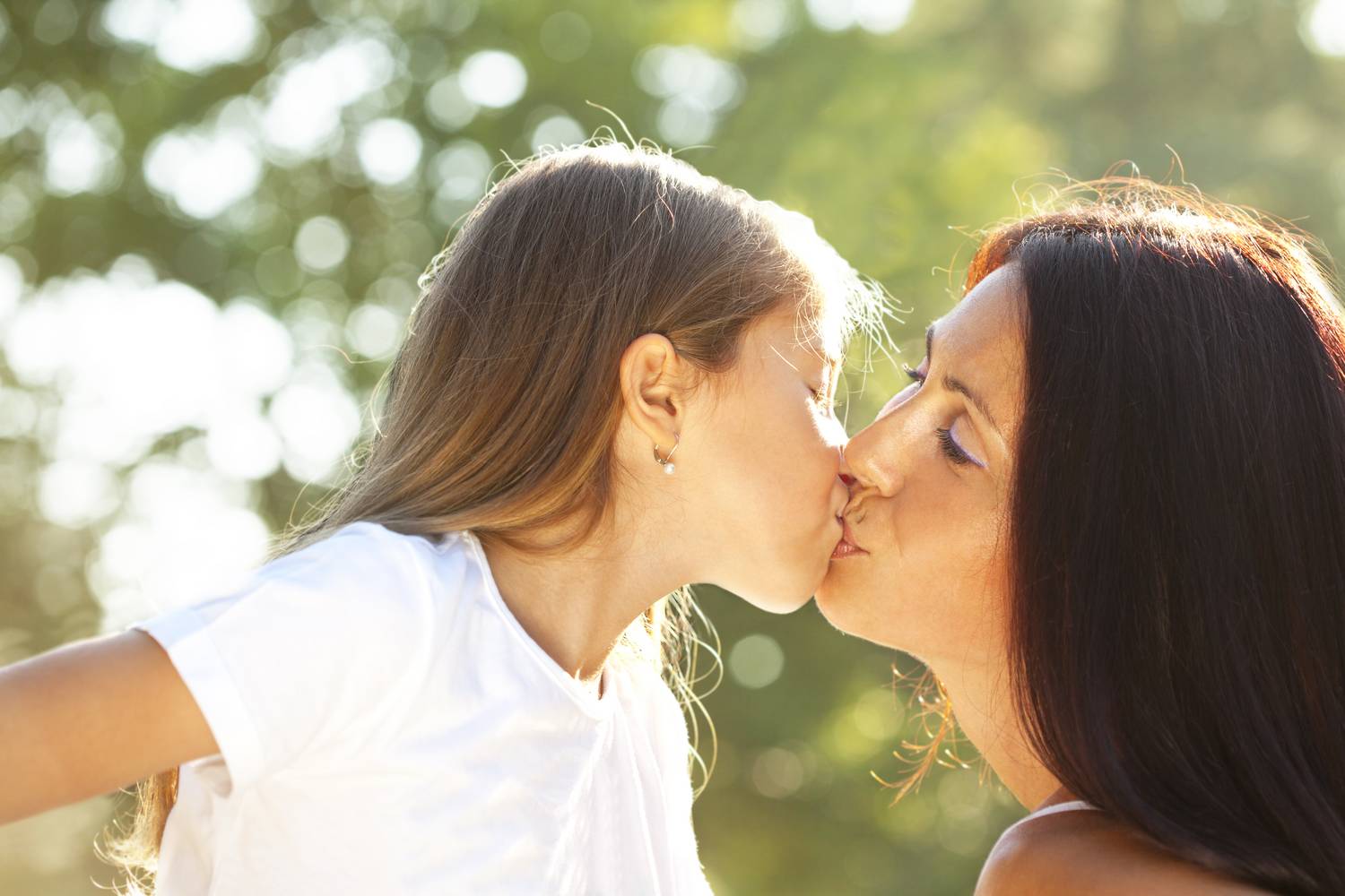 Lesbian kissing deep outdoor